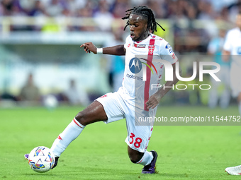 Warren Bondo of AC Monza in action during the Serie A Enilive match between ACF Fiorentina and AC Monza at Stadio Artemio Franchi on Septemb...