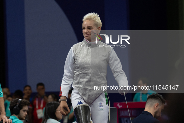 Beatrice Maria ''Bebe'' Vio Grandis of Italy competes against Nadiia Doloh of Ukraine during the Women's Foil Category B Quarterfinal at Gra...