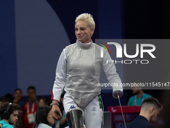 Beatrice Maria ''Bebe'' Vio Grandis of Italy competes against Nadiia Doloh of Ukraine during the Women's Foil Category B Quarterfinal at Gra...