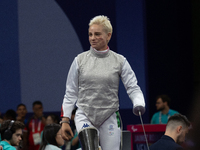 Beatrice Maria ''Bebe'' Vio Grandis of Italy competes against Nadiia Doloh of Ukraine during the Women's Foil Category B Quarterfinal at Gra...