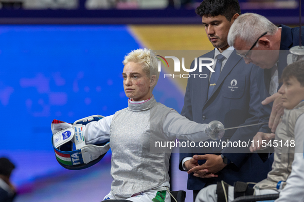 Beatrice Maria ''Bebe'' Vio Grandis of Italy competes against Nadiia Doloh of Ukraine during the Women's Foil Category B Quarterfinal at Gra...