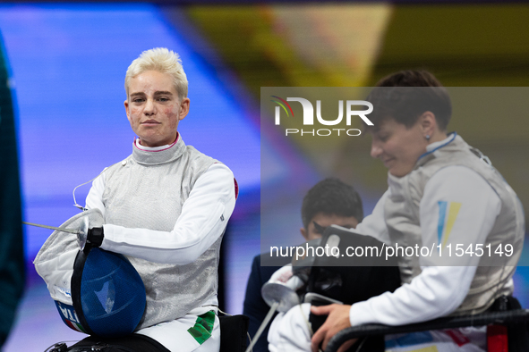 Beatrice Maria ''Bebe'' Vio Grandis of Italy competes against Nadiia Doloh of Ukraine during the Women's Foil Category B Quarterfinal at Gra...