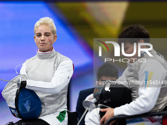 Beatrice Maria ''Bebe'' Vio Grandis of Italy competes against Nadiia Doloh of Ukraine during the Women's Foil Category B Quarterfinal at Gra...