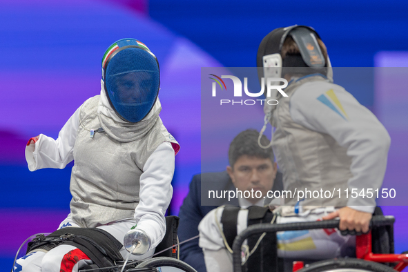 Beatrice Maria ''Bebe'' Vio Grandis of Italy competes against Nadiia Doloh of Ukraine during the Women's Foil Category B Quarterfinal at Gra...