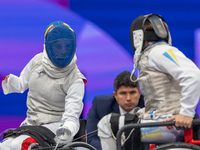 Beatrice Maria ''Bebe'' Vio Grandis of Italy competes against Nadiia Doloh of Ukraine during the Women's Foil Category B Quarterfinal at Gra...