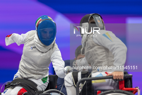 Beatrice Maria ''Bebe'' Vio Grandis of Italy competes against Nadiia Doloh of Ukraine during the Women's Foil Category B Quarterfinal at Gra...