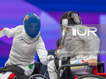 Beatrice Maria ''Bebe'' Vio Grandis of Italy competes against Nadiia Doloh of Ukraine during the Women's Foil Category B Quarterfinal at Gra...