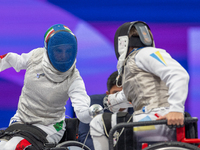 Beatrice Maria ''Bebe'' Vio Grandis of Italy competes against Nadiia Doloh of Ukraine during the Women's Foil Category B Quarterfinal at Gra...