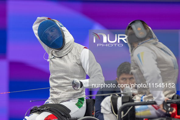 Beatrice Maria ''Bebe'' Vio Grandis of Italy competes against Nadiia Doloh of Ukraine during the Women's Foil Category B Quarterfinal at Gra...