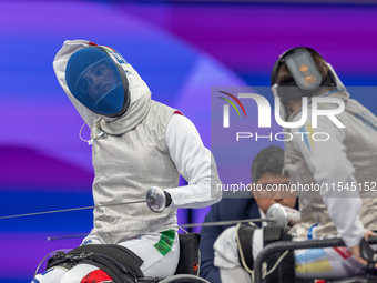 Beatrice Maria ''Bebe'' Vio Grandis of Italy competes against Nadiia Doloh of Ukraine during the Women's Foil Category B Quarterfinal at Gra...