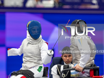 Beatrice Maria ''Bebe'' Vio Grandis of Italy competes against Nadiia Doloh of Ukraine during the Women's Foil Category B Quarterfinal at Gra...