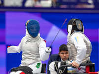 Beatrice Maria ''Bebe'' Vio Grandis of Italy competes against Nadiia Doloh of Ukraine during the Women's Foil Category B Quarterfinal at Gra...