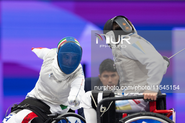 Beatrice Maria ''Bebe'' Vio Grandis of Italy competes against Nadiia Doloh of Ukraine during the Women's Foil Category B Quarterfinal at Gra...