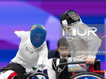 Beatrice Maria ''Bebe'' Vio Grandis of Italy competes against Nadiia Doloh of Ukraine during the Women's Foil Category B Quarterfinal at Gra...