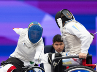 Beatrice Maria ''Bebe'' Vio Grandis of Italy competes against Nadiia Doloh of Ukraine during the Women's Foil Category B Quarterfinal at Gra...