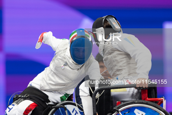 Beatrice Maria ''Bebe'' Vio Grandis of Italy competes against Nadiia Doloh of Ukraine during the Women's Foil Category B Quarterfinal at Gra...