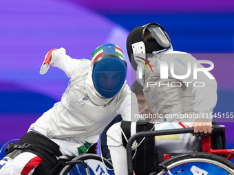 Beatrice Maria ''Bebe'' Vio Grandis of Italy competes against Nadiia Doloh of Ukraine during the Women's Foil Category B Quarterfinal at Gra...