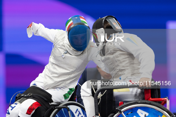 Beatrice Maria ''Bebe'' Vio Grandis of Italy competes against Nadiia Doloh of Ukraine during the Women's Foil Category B Quarterfinal at Gra...