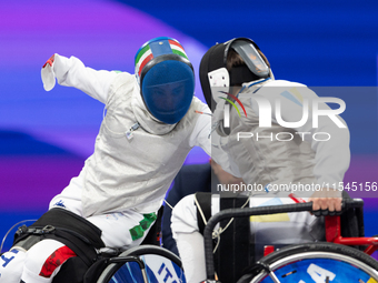 Beatrice Maria ''Bebe'' Vio Grandis of Italy competes against Nadiia Doloh of Ukraine during the Women's Foil Category B Quarterfinal at Gra...