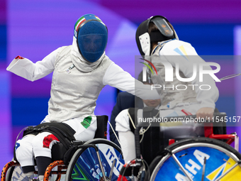 Beatrice Maria ''Bebe'' Vio Grandis of Italy competes against Nadiia Doloh of Ukraine during the Women's Foil Category B Quarterfinal at Gra...