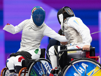 Beatrice Maria ''Bebe'' Vio Grandis of Italy competes against Nadiia Doloh of Ukraine during the Women's Foil Category B Quarterfinal at Gra...