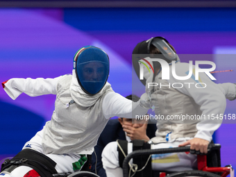 Beatrice Maria ''Bebe'' Vio Grandis of Italy competes against Nadiia Doloh of Ukraine during the Women's Foil Category B Quarterfinal at Gra...