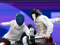 Beatrice Maria ''Bebe'' Vio Grandis of Italy competes against Nadiia Doloh of Ukraine during the Women's Foil Category B Quarterfinal at Gra...