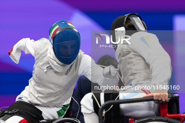 Beatrice Maria ''Bebe'' Vio Grandis of Italy competes against Nadiia Doloh of Ukraine during the Women's Foil Category B Quarterfinal at Gra...