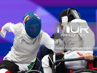 Beatrice Maria ''Bebe'' Vio Grandis of Italy competes against Nadiia Doloh of Ukraine during the Women's Foil Category B Quarterfinal at Gra...