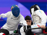 Beatrice Maria ''Bebe'' Vio Grandis of Italy competes against Nadiia Doloh of Ukraine during the Women's Foil Category B Quarterfinal at Gra...