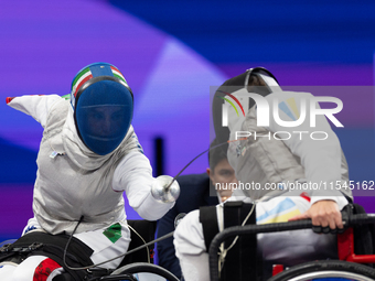 Beatrice Maria ''Bebe'' Vio Grandis of Italy competes against Nadiia Doloh of Ukraine during the Women's Foil Category B Quarterfinal at Gra...