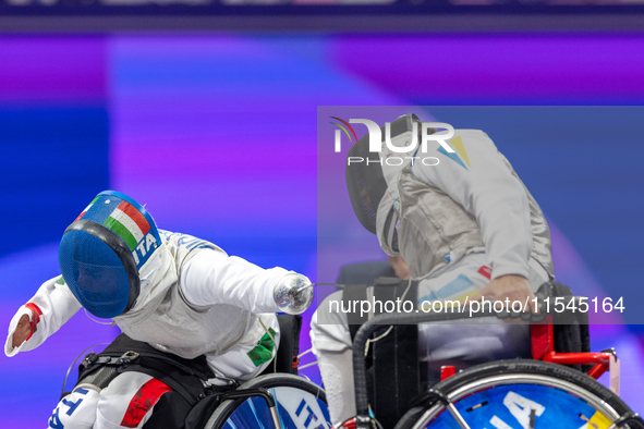 Beatrice Maria ''Bebe'' Vio Grandis of Italy competes against Nadiia Doloh of Ukraine during the Women's Foil Category B Quarterfinal at Gra...