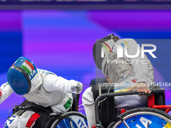 Beatrice Maria ''Bebe'' Vio Grandis of Italy competes against Nadiia Doloh of Ukraine during the Women's Foil Category B Quarterfinal at Gra...