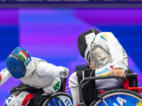 Beatrice Maria ''Bebe'' Vio Grandis of Italy competes against Nadiia Doloh of Ukraine during the Women's Foil Category B Quarterfinal at Gra...