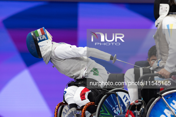 Beatrice Maria ''Bebe'' Vio Grandis of Italy competes against Nadiia Doloh of Ukraine during the Women's Foil Category B Quarterfinal at Gra...