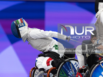 Beatrice Maria ''Bebe'' Vio Grandis of Italy competes against Nadiia Doloh of Ukraine during the Women's Foil Category B Quarterfinal at Gra...