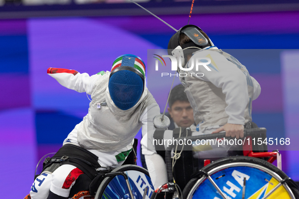 Beatrice Maria ''Bebe'' Vio Grandis of Italy competes against Nadiia Doloh of Ukraine during the Women's Foil Category B Quarterfinal at Gra...