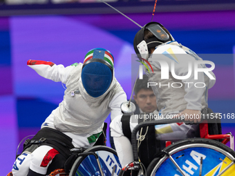 Beatrice Maria ''Bebe'' Vio Grandis of Italy competes against Nadiia Doloh of Ukraine during the Women's Foil Category B Quarterfinal at Gra...