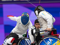 Beatrice Maria ''Bebe'' Vio Grandis of Italy competes against Nadiia Doloh of Ukraine during the Women's Foil Category B Quarterfinal at Gra...