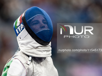 Beatrice Maria ''Bebe'' Vio Grandis of Italy competes against Nadiia Doloh of Ukraine during the Women's Foil Category B Quarterfinal at Gra...