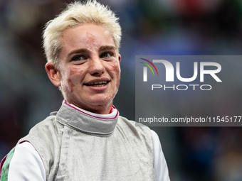 Beatrice Maria ''Bebe'' Vio Grandis of Italy competes against Nadiia Doloh of Ukraine during the Women's Foil Category B Quarterfinal at Gra...