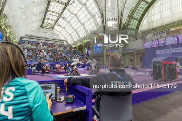 Beatrice Maria ''Bebe'' Vio Grandis of Italy competes against Nadiia Doloh of Ukraine during the Women's Foil Category B Quarterfinal at Gra...