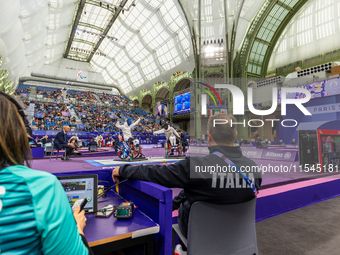 Beatrice Maria ''Bebe'' Vio Grandis of Italy competes against Nadiia Doloh of Ukraine during the Women's Foil Category B Quarterfinal at Gra...