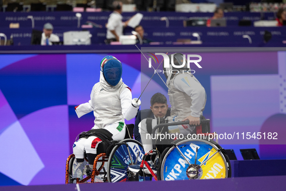 Beatrice Maria ''Bebe'' Vio Grandis of Italy competes against Nadiia Doloh of Ukraine during the Women's Foil Category B Quarterfinal at Gra...