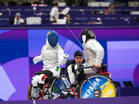 Beatrice Maria ''Bebe'' Vio Grandis of Italy competes against Nadiia Doloh of Ukraine during the Women's Foil Category B Quarterfinal at Gra...