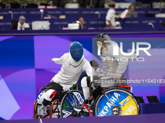 Beatrice Maria ''Bebe'' Vio Grandis of Italy competes against Nadiia Doloh of Ukraine during the Women's Foil Category B Quarterfinal at Gra...