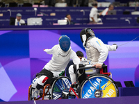 Beatrice Maria ''Bebe'' Vio Grandis of Italy competes against Nadiia Doloh of Ukraine during the Women's Foil Category B Quarterfinal at Gra...