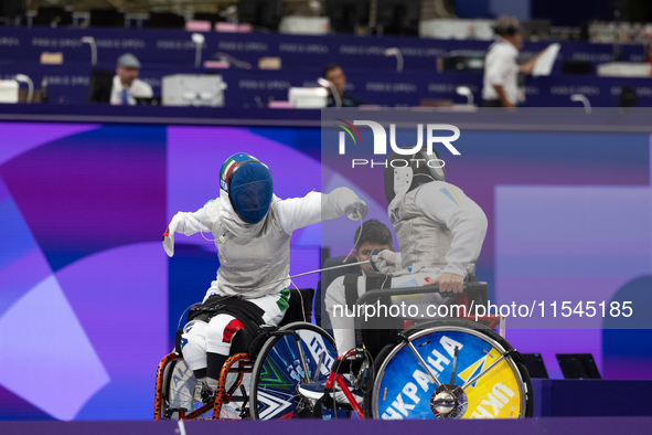 Beatrice Maria ''Bebe'' Vio Grandis of Italy competes against Nadiia Doloh of Ukraine during the Women's Foil Category B Quarterfinal at Gra...