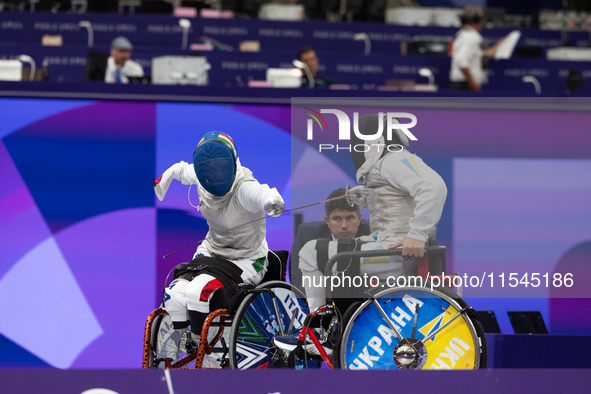 Beatrice Maria ''Bebe'' Vio Grandis of Italy competes against Nadiia Doloh of Ukraine during the Women's Foil Category B Quarterfinal at Gra...