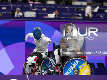 Beatrice Maria ''Bebe'' Vio Grandis of Italy competes against Nadiia Doloh of Ukraine during the Women's Foil Category B Quarterfinal at Gra...